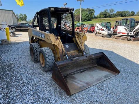 JD 317 skid Steer with Hand Controls / Aux Hydraulic Foot